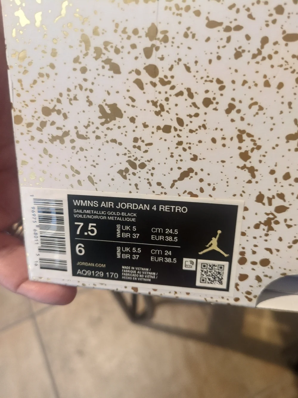 Air Jordan Women's All-White Sneakers with Gold Accents